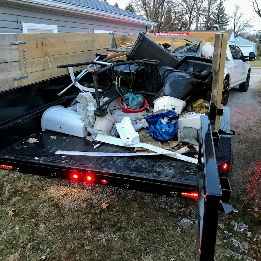 Roll-off dumpster delivered to a residential driveway in Newman
